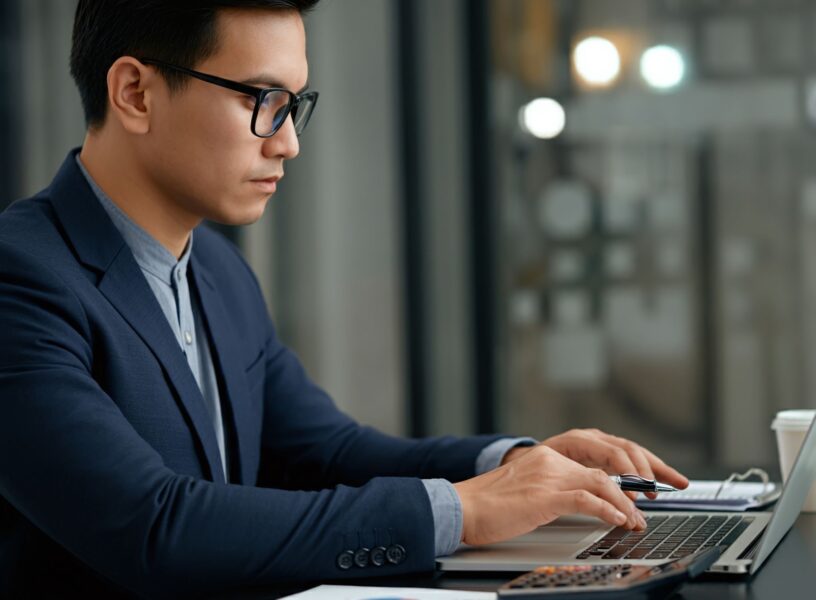 financial-expert-analyzing-profit-with-detailed-graphs-calculations_compressed